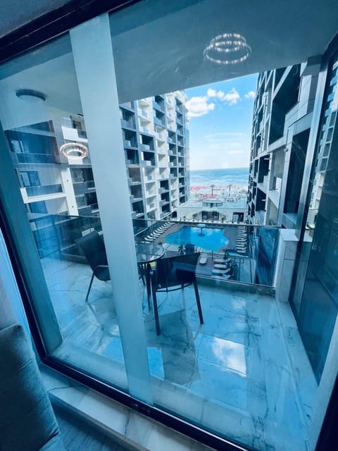 Balcony/Terrace, Seating area, Pool view, Sea view