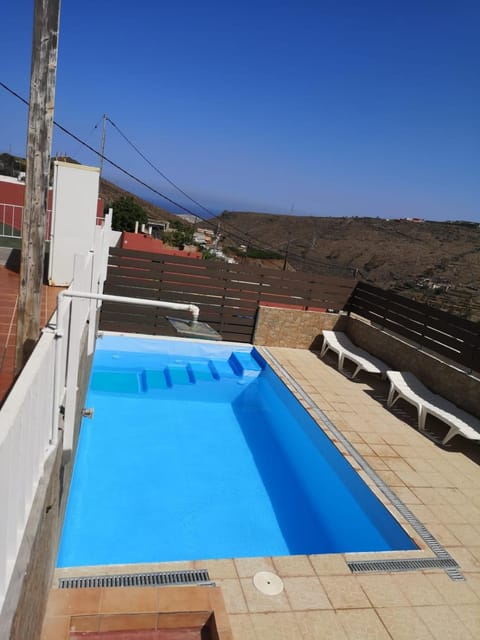 Swimming pool, sunbed