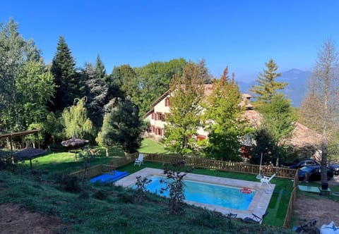 Property building, Living room, Swimming pool