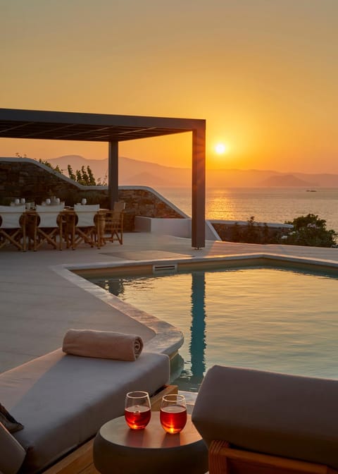 Natural landscape, BBQ facilities, View (from property/room), Dining area, Mountain view, Pool view, Sea view, Swimming pool, Sunset, sunbed