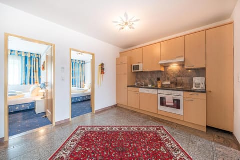 Kitchen or kitchenette, oven, stove