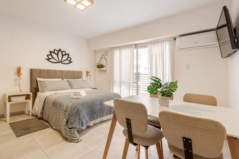 Bed, TV and multimedia, Dining area, Bedroom, air conditioner