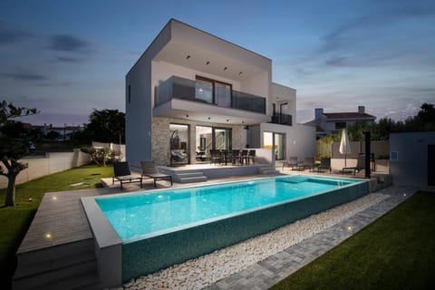 Property building, Swimming pool, Swimming pool, Sunset