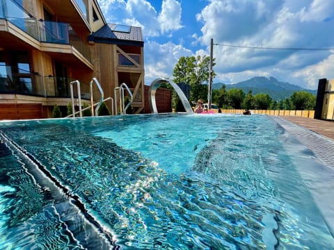 Property building, Day, Natural landscape, Mountain view, Mountain view, Pool view, Pool view, Swimming pool, Swimming pool, Swimming pool