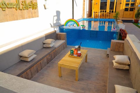 Patio, Day, View (from property/room), Seating area, Pool view, Swimming pool