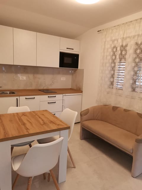 TV and multimedia, Kitchen or kitchenette, Living room, Seating area, Dining area, minibar