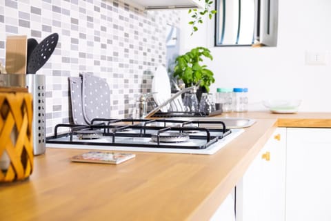 Kitchen or kitchenette, stove