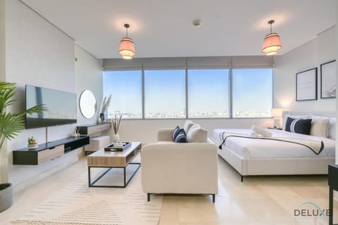 Property building, TV and multimedia, Living room, Seating area, Swimming pool