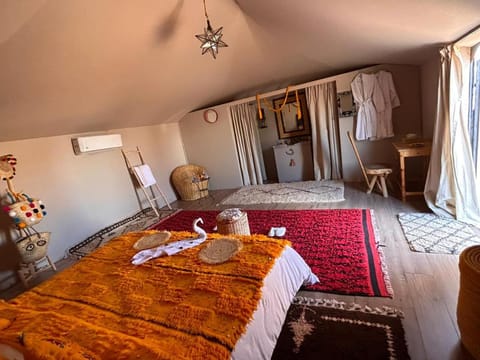 Photo of the whole room, Seating area, Bedroom, towels, air conditioner