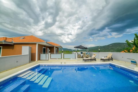 Patio, Natural landscape, Mountain view, Pool view, Swimming pool, sunbed