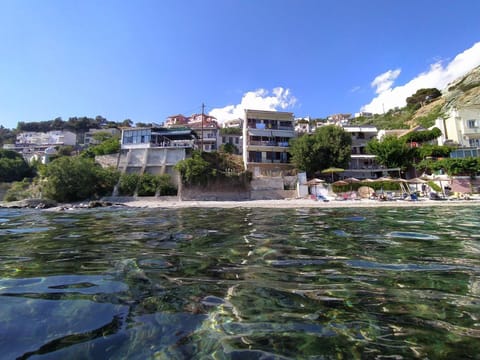 Property building, Nearby landmark, Neighbourhood, Beach