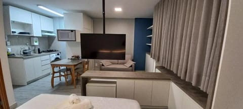 TV and multimedia, Kitchen or kitchenette, Living room, Photo of the whole room, Seating area, Dining area, Bedroom, minibar, stove