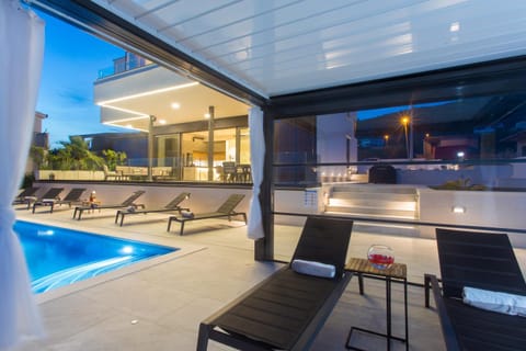 Property building, Night, Swimming pool, sunbed