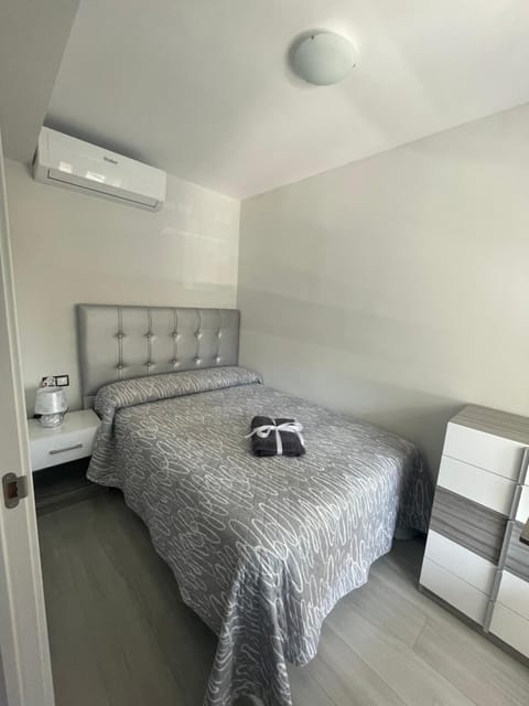 Bed, Photo of the whole room, Bedroom, towels, air conditioner