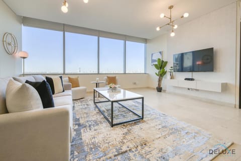 Property building, TV and multimedia, Living room, Seating area, Swimming pool