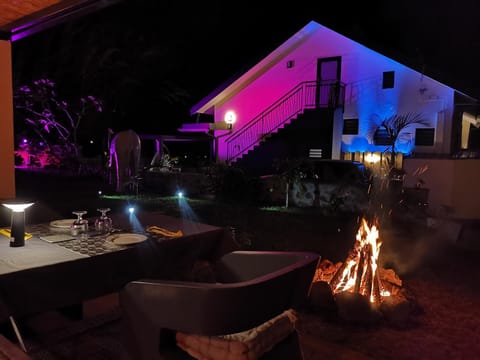 Property building, Patio, Night, Seating area, Dining area, Evening entertainment