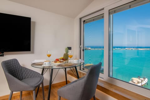 Living room, Seating area, Dining area, Beach, Sea view