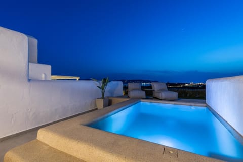 Patio, Night, Pool view, Swimming pool, sunbed