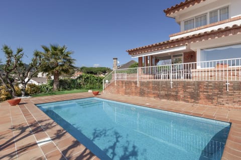 Property building, Living room, Swimming pool