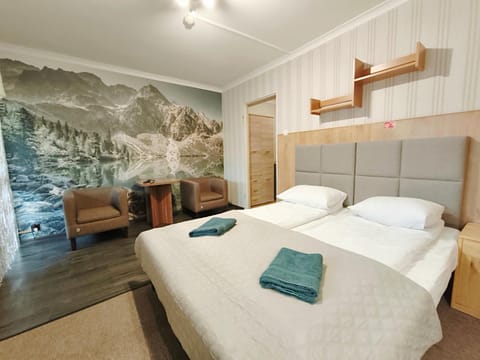 Bed, Living room, Other, Other, Other, Photo of the whole room, Decorative detail, Seating area, Bedroom, furniture, furniture, towels, towels
