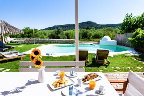 Natural landscape, Garden, Dining area, Swimming pool, sunbed
