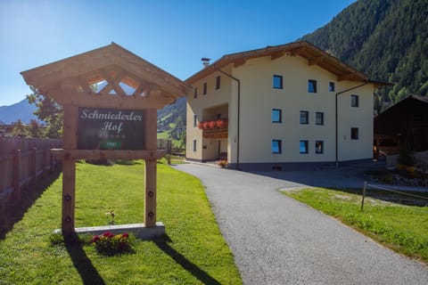 Property building, Facade/entrance, Property logo or sign, Garden