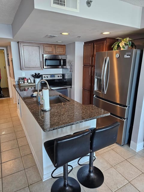 Beachfront Condo Panama City Beach Gulf Front Views walk to Pineapple Willy's Apartment hotel in Panama City Beach