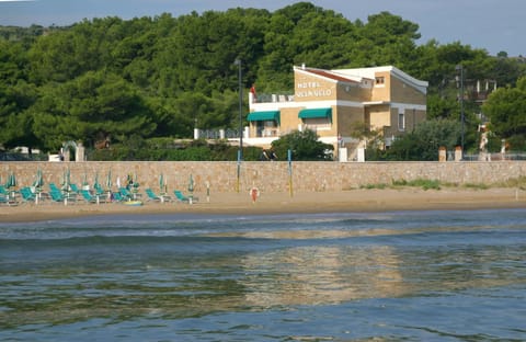 Property building, Nearby landmark, Day, Natural landscape, Beach, Sea view