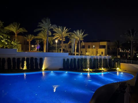 Property building, Night, Pool view, Swimming pool, Swimming pool, sunbed