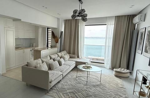 TV and multimedia, Living room, Seating area, Lake view
