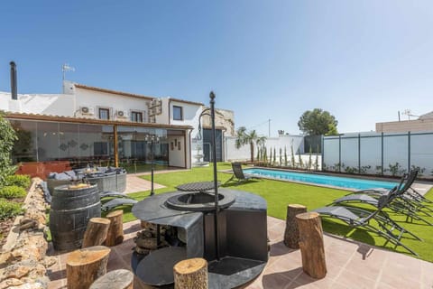 Property building, BBQ facilities, Garden, Pool view, Swimming pool