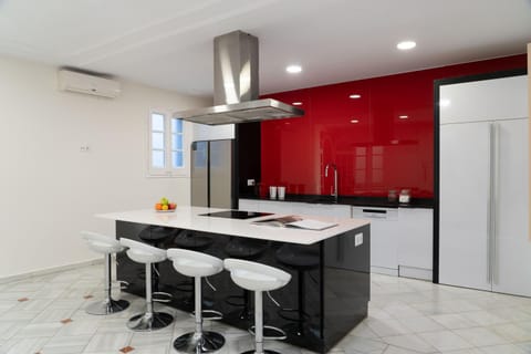 Kitchen or kitchenette, Dining area, stove, air conditioner