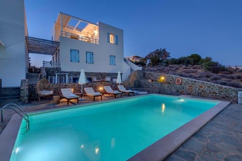 Property building, Patio, Night, Pool view, sunbed
