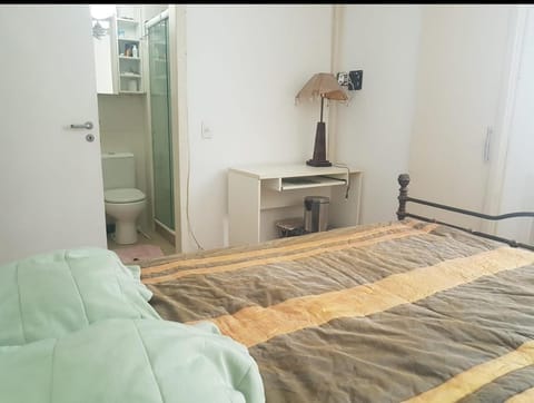 Shower, Toilet, Bed, Seating area, Dining area, group of guests, locker, air conditioner