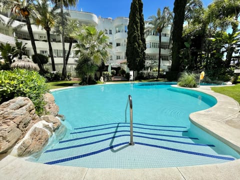 Property building, Pool view, Swimming pool, sunbed