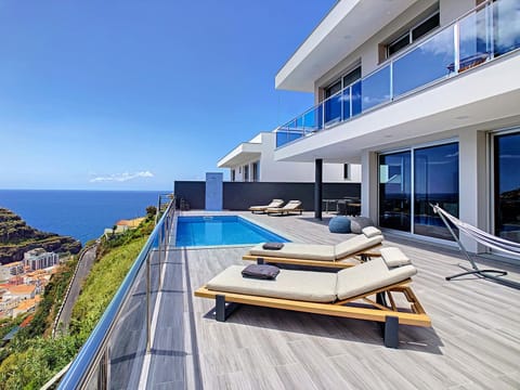 Property building, View (from property/room), Mountain view, Sea view, Swimming pool