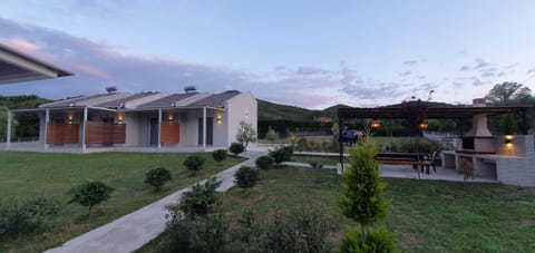 Property building, Patio, Natural landscape, Garden, Dining area