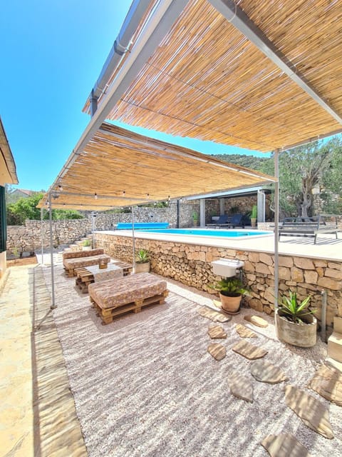 Patio, Day, Seating area, Pool view, Swimming pool, sunbed