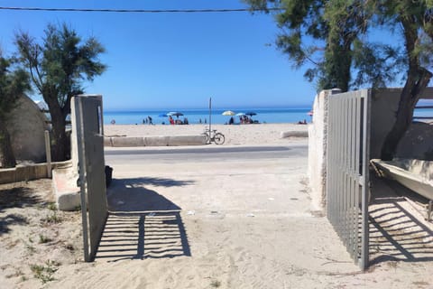 Property building, Facade/entrance, Natural landscape, Beach, Sea view
