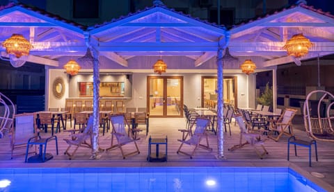 Patio, Night, Pool view, Swimming pool, sunbed