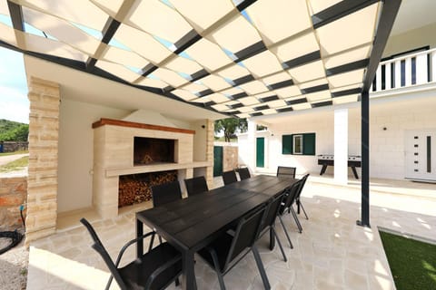 Patio, Day, BBQ facilities, Seating area