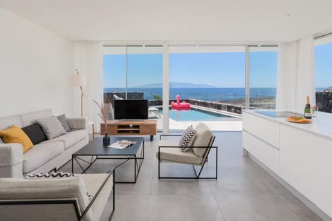 Communal lounge/ TV room, Natural landscape, TV and multimedia, View (from property/room), Living room, Seating area, Mountain view, Sea view