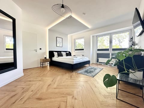 Modern Apartment - für Freunde & Familien, stadtnah, Parkplatz, E-Ladestation, Gitterbox für Fahrräder, Fitnessstudio, digitale Gästemappe mit Restaurant- und Unternehmenstipps Apartment in Koblenz