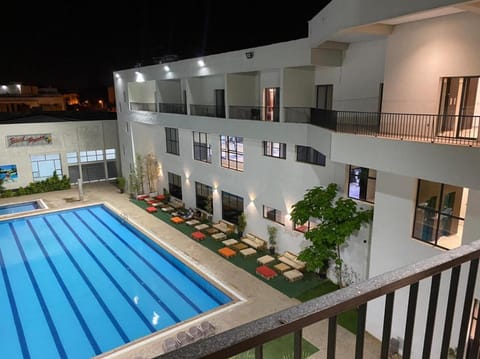Property building, Patio, Night, Balcony/Terrace, Pool view
