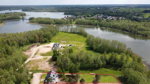 Domek ZOZO nad jeziorem w Okuniowcu House in Lithuania