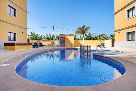 Property building, Living room, Swimming pool
