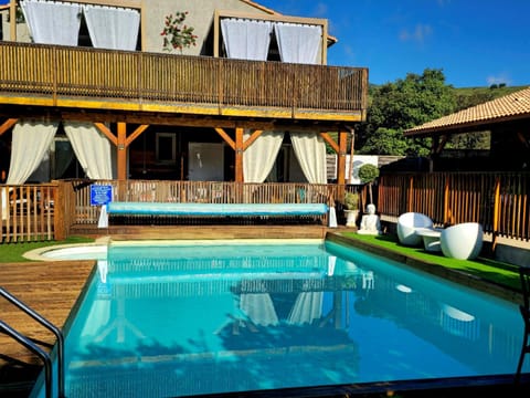 Property building, Day, Pool view, Swimming pool, sunbed