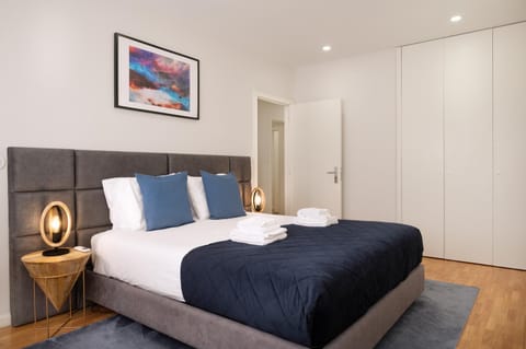 Bed, Bedroom, towels, wardrobe, air conditioner