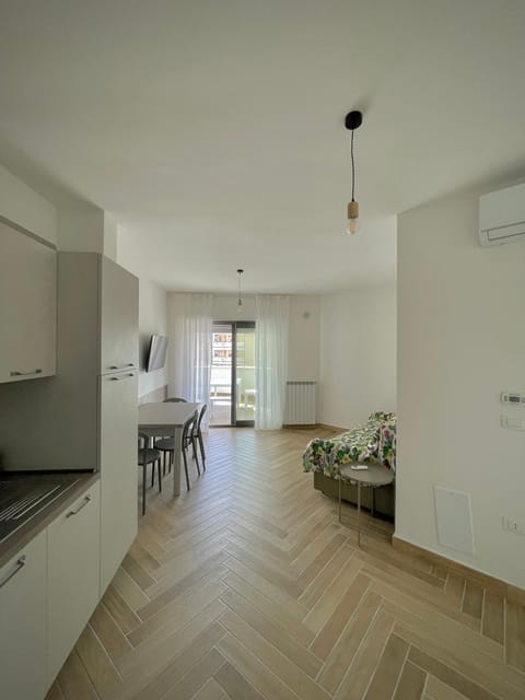 Bed, Kitchen or kitchenette, Living room, air conditioner
