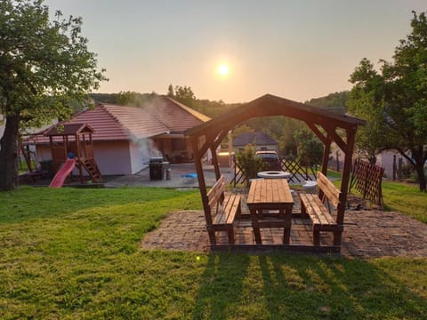 Property building, Day, Natural landscape, Garden, Sunset, sunbed